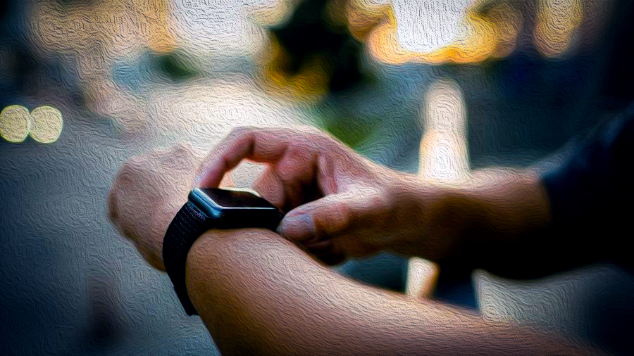 Detalhe de mão de homem usando um relógio